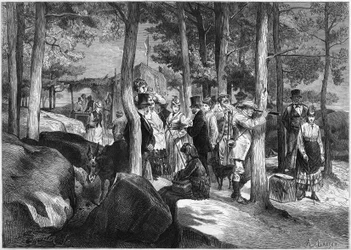 Toeristen bij de kloven van Apremont, nabij de ingang van de grot, in het bos van Fontainebleau