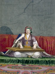 Turks meisje speelt een tokkelinstrument, uit Collectie van Honderd Prenten die de Verschillende Naties van de Levant Vertegenwoordigen door Charles de Ferriol, gegraveerd door Gerard Scotin (1671-1716)