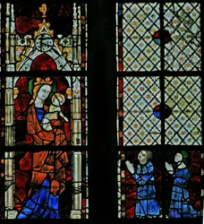 Raam w125 met de Maagd Maria; twee schenkers