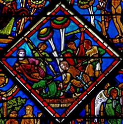 Raam w15 met een scène in het Barmhartige Samaritaan raam: de pelgrim wordt aangevallen