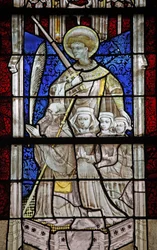 St. Joris met een donateur en familie
