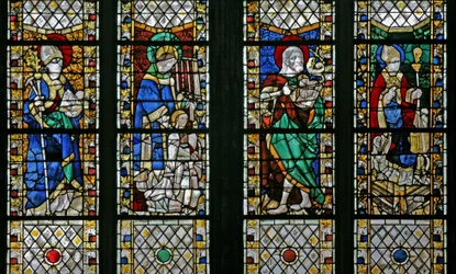 Raam w47 met St. Eloi, St. Laurentius, St. Johannes de Doper en St. Nicolaas