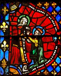 Raam w6 met een scène uit het leven van de Maagd Maria: Jozef vraagt de Maagd Maria om vergeving