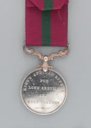 Medaille voor Lange Dienst en Goed Gedrag, Regiments Sergeant Majoor Hassan Jabir, The King
