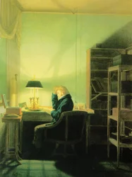 Man leest bij lamplicht