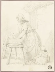 Vrouw die kleren wast