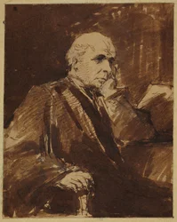 De zittende man
