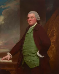 Portret van James Cross uit Clifton, Bristol (1739-1791), driekwartlengte, aan een tafel met daarachter een landschap