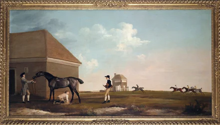 Het renpaard Gimcrack op Newmarket Heath met de trainer, de staljongen en de jockey