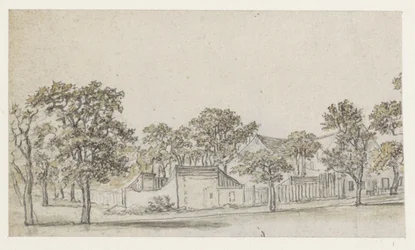 Groep huizen tussen bomen