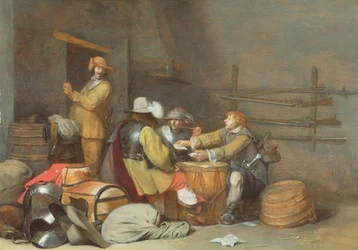 Soldaten die kaarten in een wachtkamer