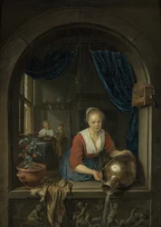 Dienstmeisje bij het raam