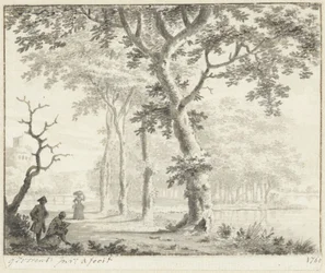 Bomen aan de waterkant en een tekenaar