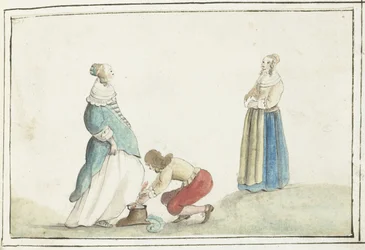 Heer strikt de schoen van een dame