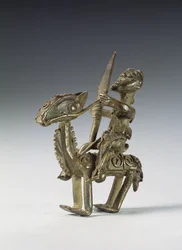 Ruiter op paard met decoratief harnas