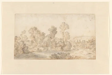 Heuvelachtig landschap met hoge bomen langs een rivier