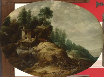 Watermolen bij een beboste rots