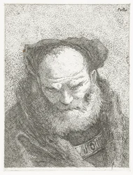 Oude man met baard en gebogen hoofd