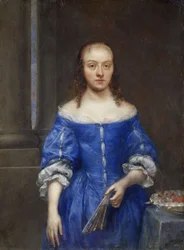 Portret van een vrouw in een blauwe jurk