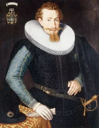 Portret van een vijfentwintigjarige heer, driekwart ten voeten uit, in een zwart wambuis met turquoise en gouden mouwen en een witte molensteenkraag, bij een gedrapeerde tafel