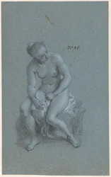 Zittende vrouw
