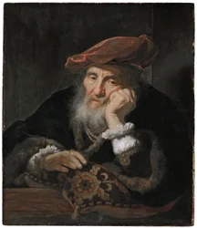 Een oude man bij een raam