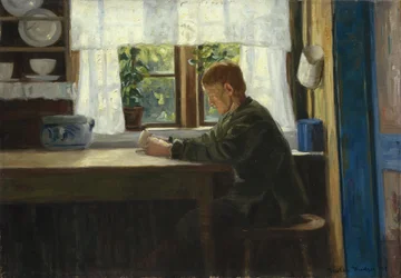 Jongen in keukeninterieur