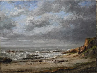 Uitzicht op een ruwe zee bij een klif