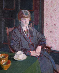 Vrouw Zittend aan een Tafel