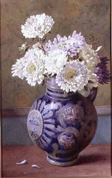 Chrysanten in een steengoed kan
