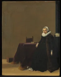 Portret van een vrouw met een hond, ca. 1635