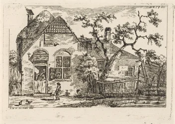 Jongen met hoepel bij een boerderij