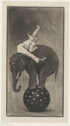 Olifant balancerend op een bal met een man op zijn rug