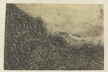 Rotsachtig landschap met een weg en een rivier