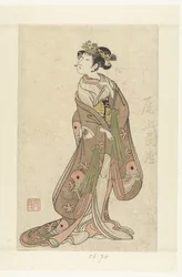 De acteur Onoe Tamizo I in vrouwenrol