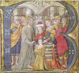 Geïllustreerde initiaal B die Christus afbeeldt die een bezeten vrouw geneest