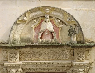 Madonna van de Barmhartigheid, detail van het portaal lunet