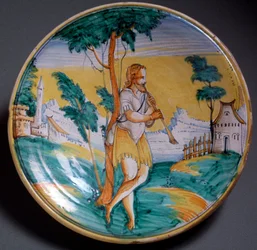 Renaissance kunst: bord versierd met een fluitspeler - Eind 16e eeuw Productie van Viterbo, Italië Florence, Museo Nazionale del Bargello