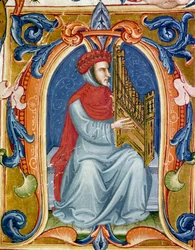 Portret van Francesco Landini die orgel speelt