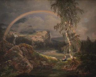Noors landschap met een regenboog