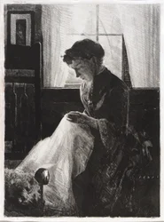 Profielportret van een naaiende vrouw