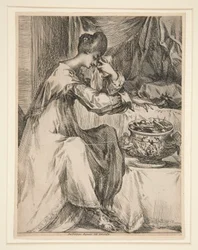 Vrouw bij de vuurkorf