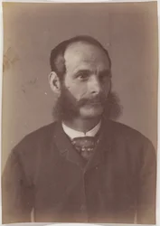 [Portret van een man met bakkebaarden].
