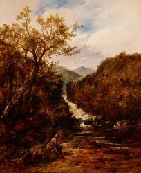 Visser bij een beboste waterval