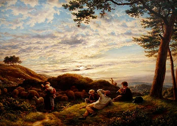 Herderjongens die hun kudde hoeden bij zonsondergang