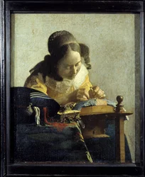 De kantwerkster. Schilderij van Jan (Johannes) Vermeer van Delft (1632-1675), circa 1658-1660. Afmetingen: 0,24 x 0,21 m. Louvre Museum.