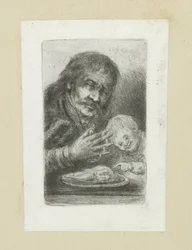 Man en kind aan de eettafel