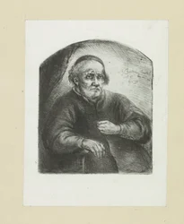 Oude man in een leunstoel
