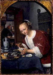 Jong meisje eet oesters