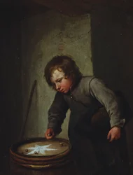Jongen die met knikkers speelt